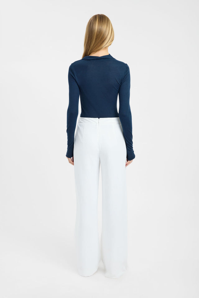 Presenting the Anna Wool Long Sleeve womens blouse with fitted cut in asymmetry neckline and navy full straight sleeves back