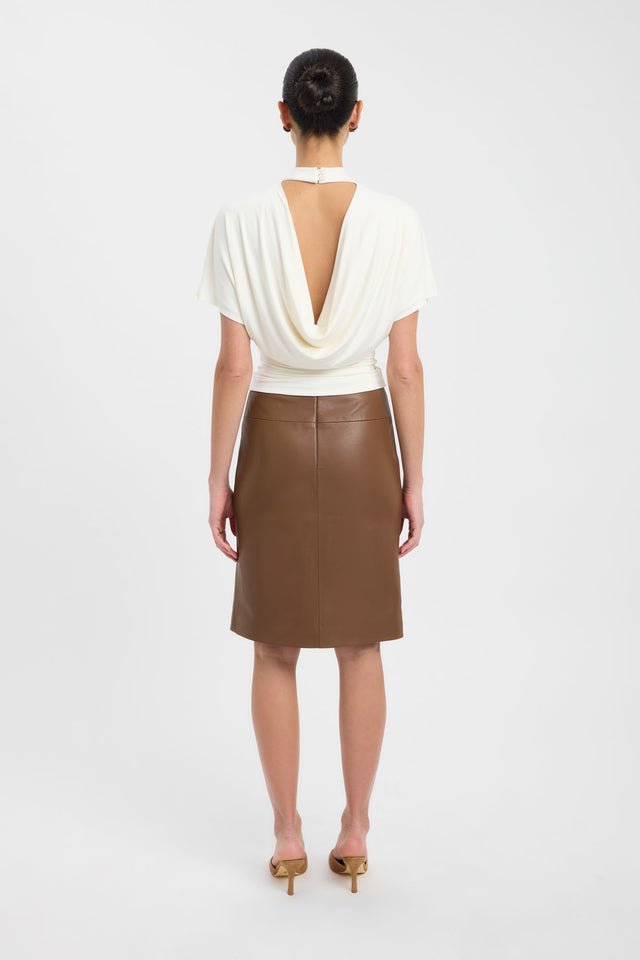 Designed with the Harley Top womens blouse in ivory with fitted high-neck and short sleeves back