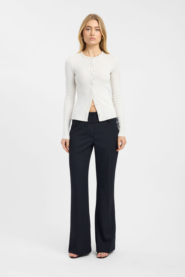 Showcase the Atlas Snap Long Sleeve Top womens-blouse in snow with a fitted round neckline and full straight sleeves front