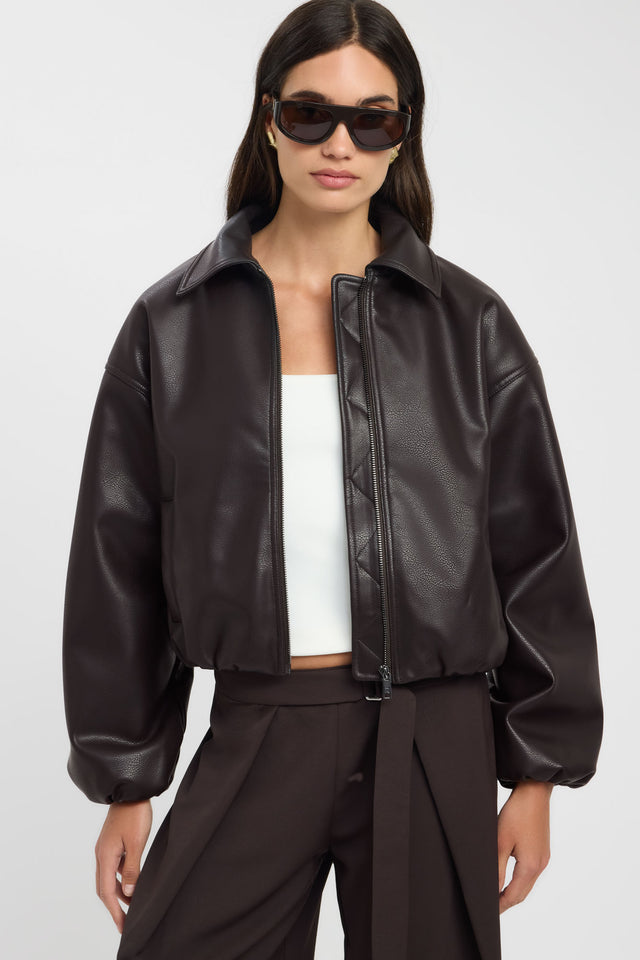Crafted as the Heavy Phoenix Bomber Jacket in womens coats and jackets with full puffed sleeves and short oversized fit in black detail