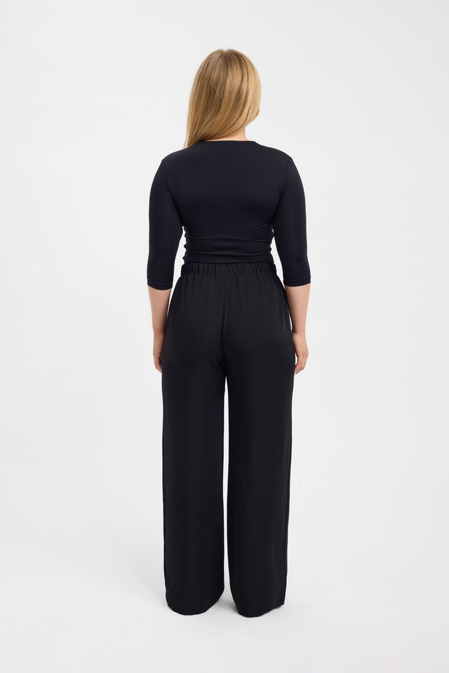 View of the Riley Lace Top womens-blouse in black featuring fitted silhouette with three-fourth sleeves product