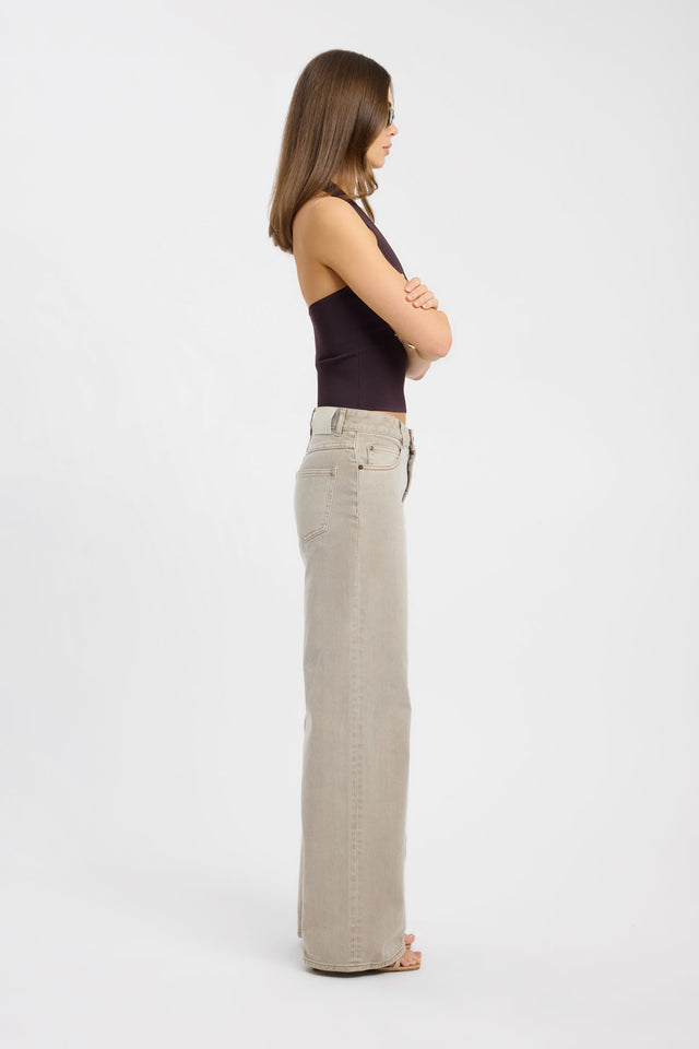 Crafted from beige denim, the Mateo Wide Leg Jean in womens regular pants with wide-leg high-rise side