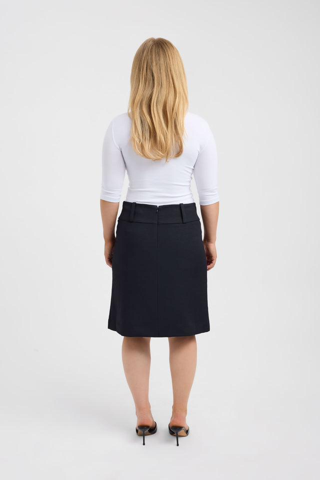 Featuring the Ariel Low Rise Midi Skirt womens-skirts with straight hem, knee length, and black color detail