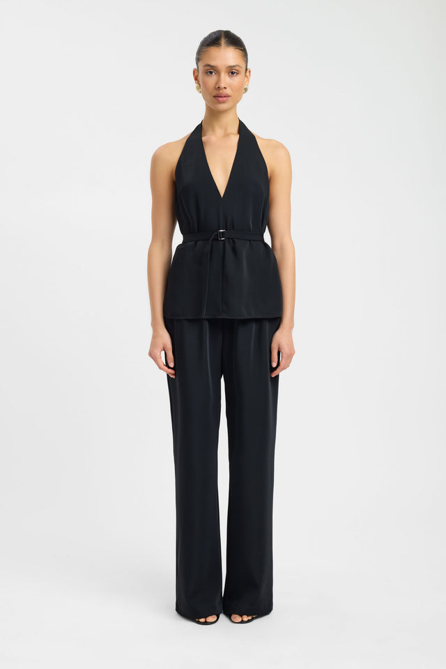 Showcasing the Maria Low Back Top womens blouse in black with halter neckline, v-neck, fitted silhouette and sleeveless design front