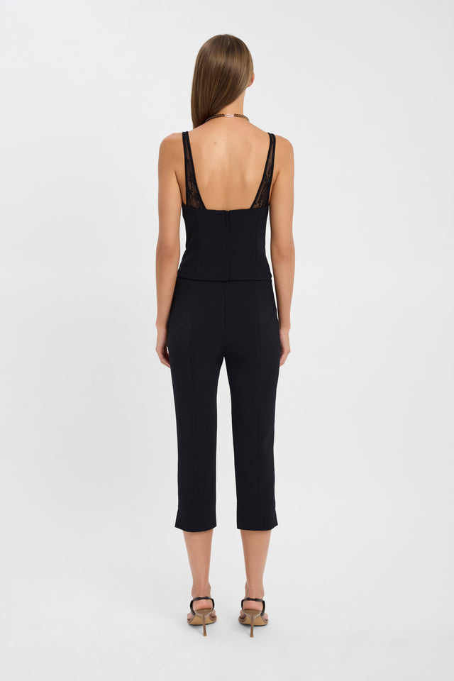 Crafted with the Astra Lace Top womens-blouse in black with fitted sweetheart neckline and sleeveless cut back