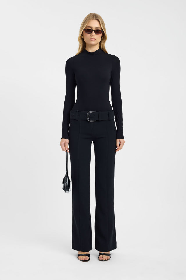 Featuring the Lori Bodysuit in a high-neck womens bodysuit with black on-body