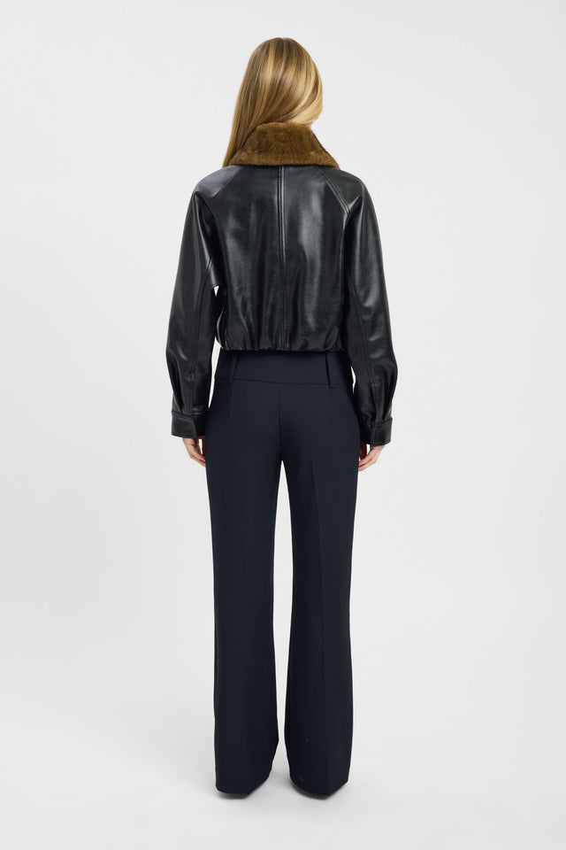 Presenting the Heavy Phoenix Fur Jacket in women's coats and jackets with full sleeves, aviator style, short length, and black color back