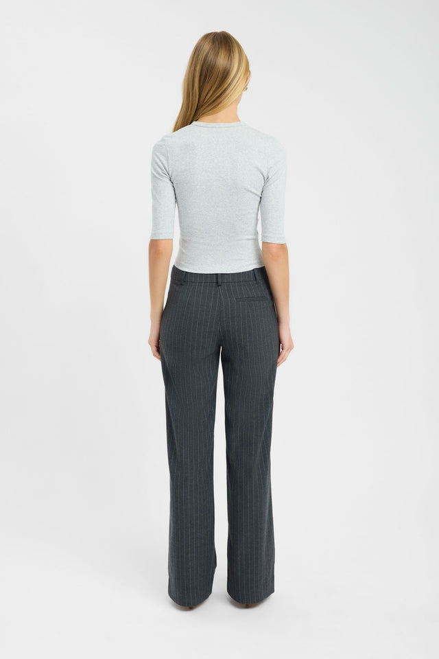 Displaying the Nat Button Top womens-blouse in light grey with fitted v-neck and half sleeves back