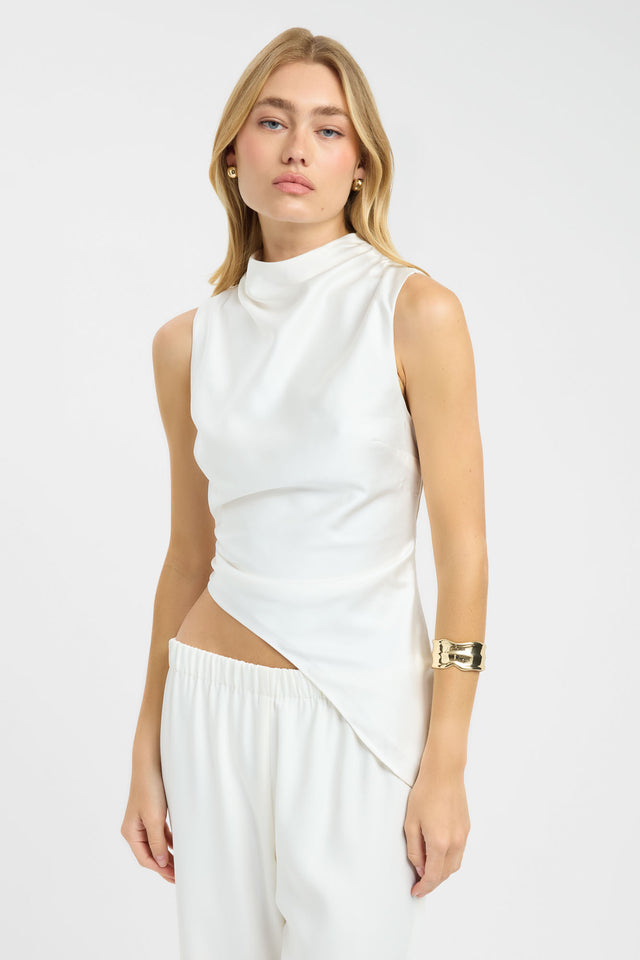 Featuring Palermo High Neck Top womens-blouse in ivory with fitted silhouette and sleeveless design detail